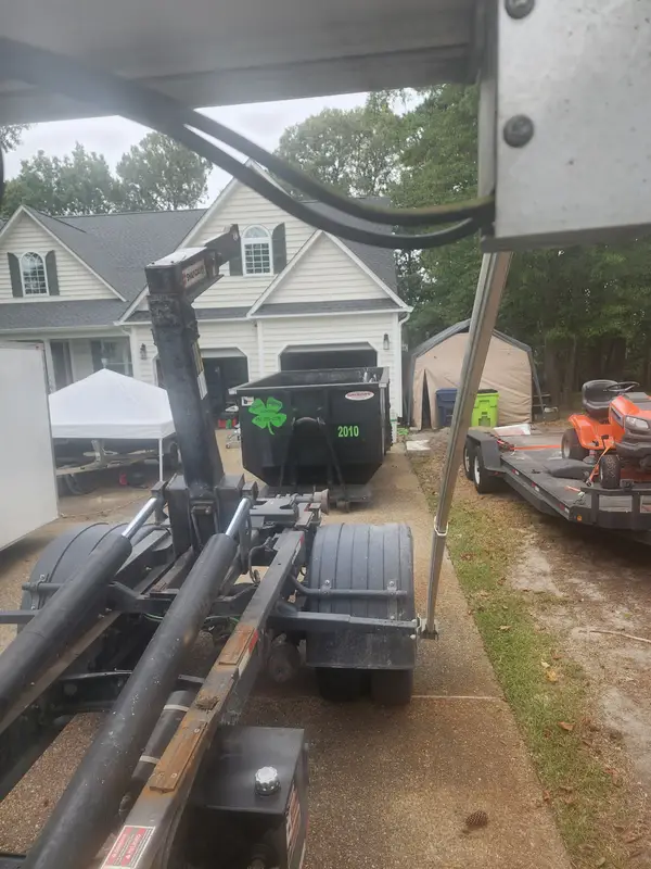 Irish Greens container 2010 dropped in a home driveway, seen from the truck