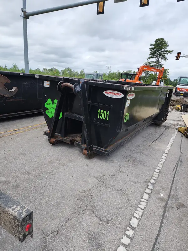 Irish Greens container 1501 on a road project under traffic signals